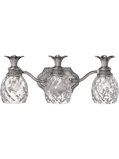 Pineapple Triple Bath Sconce With Clear Optic Glass in Polished Antique Nickel.